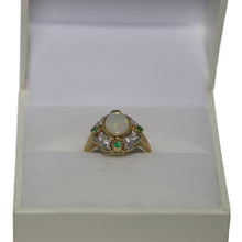 Load image into Gallery viewer, 9ct Yellow Gold Cabochon Millgrain Set Opal with Scalloped Diamond Set Surround and Emeralds at Compass Points Ring
