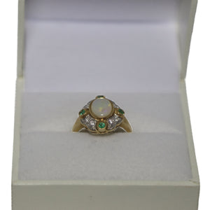 9ct Yellow Gold Cabochon Millgrain Set Opal with Scalloped Diamond Set Surround and Emeralds at Compass Points Ring