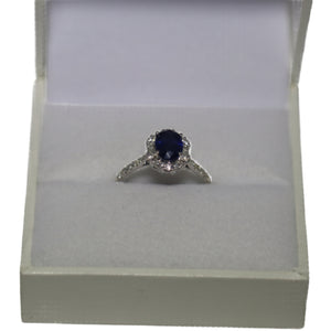 18ct White Gold Oval Sapphire and Diamond Hexagonal Cluster with Diamond Set Shoulders Ring
