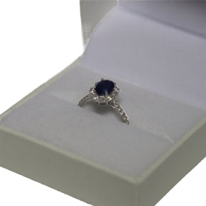 18ct White Gold Oval Sapphire and Diamond Hexagonal Cluster with Diamond Set Shoulders Ring