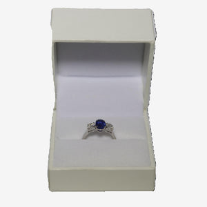 18ct White Gold Oval Blue Sapphire and Brilliant Cut Diamond Trilogy Ring