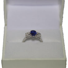 Load image into Gallery viewer, 18ct White Gold Oval Blue Sapphire and Brilliant Cut Diamond Trilogy Ring
