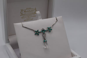 Nicole Barr green flower an crystal necklace