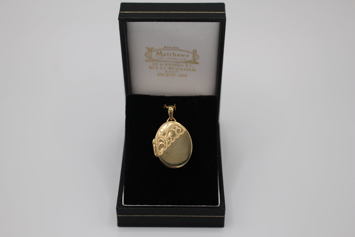 9ct gold locket with corner leaf design – W H M Jewellers